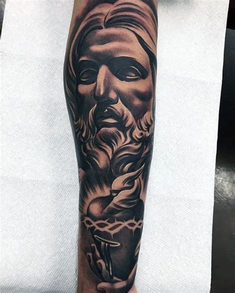 jesus christ forearm tattoo|jesus arm tattoo designs men.